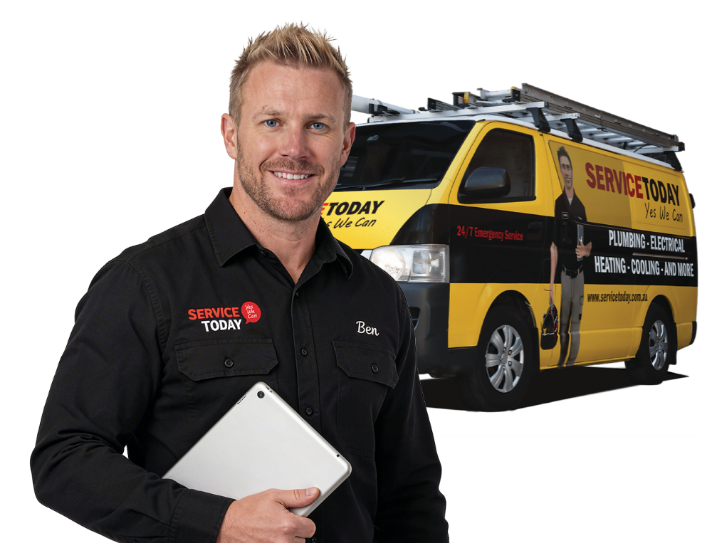Service Today technician Ben holding a tablet in front of a branded service van.